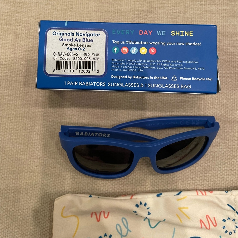Babiators in box with microfiber cloth